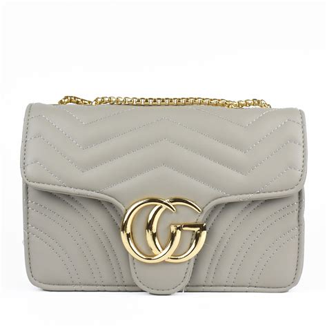 does the white gucci marmont have a gray tint|Gucci Marmont bag from nancy.